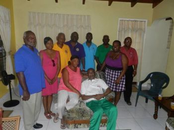 Theodore Skeete surrounded by loved ones while ill. Photo: Facebook